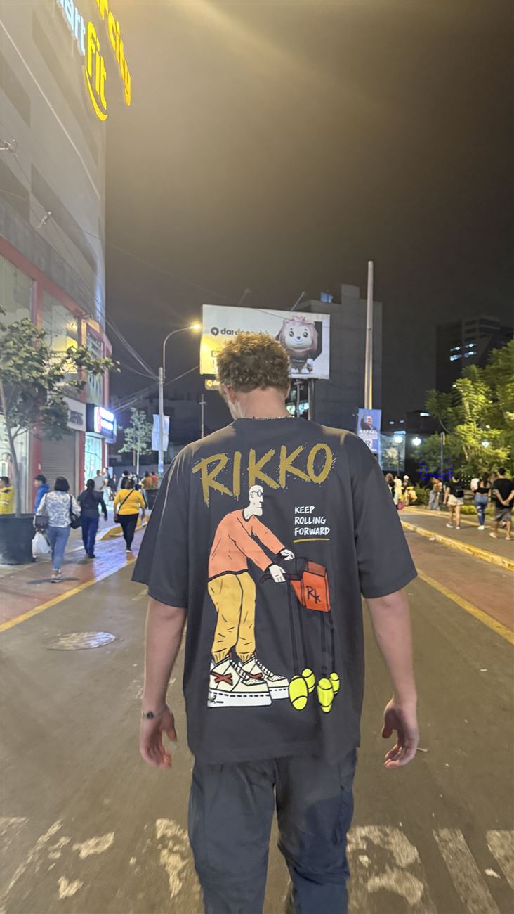 The Roller tee, back view, city at night