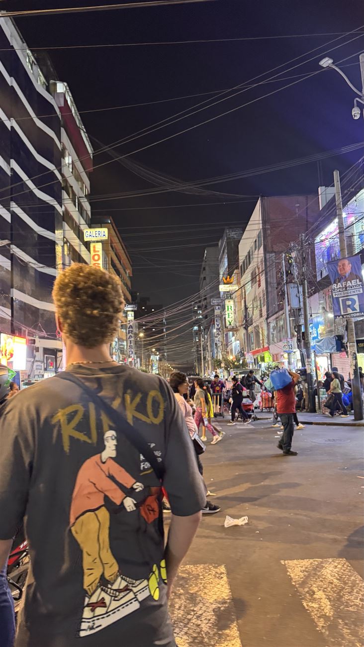 RIKKO tee on the street at night